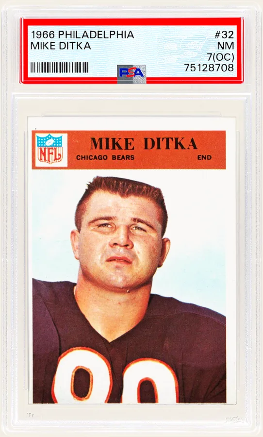 PSA slab of a 1966 Philadelphia #32 Mike Ditka card with the label reading NM 7 (OC)
